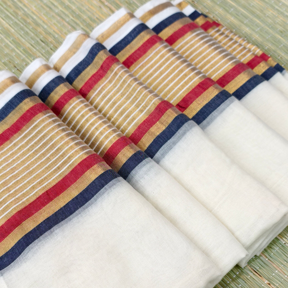 Mul cotton saree with stripe zari border