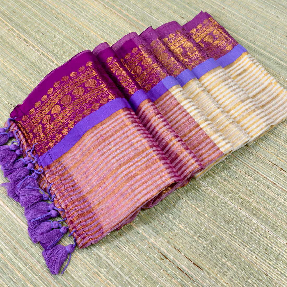 Mul cotton saree with all over zari stripes & kanchi border