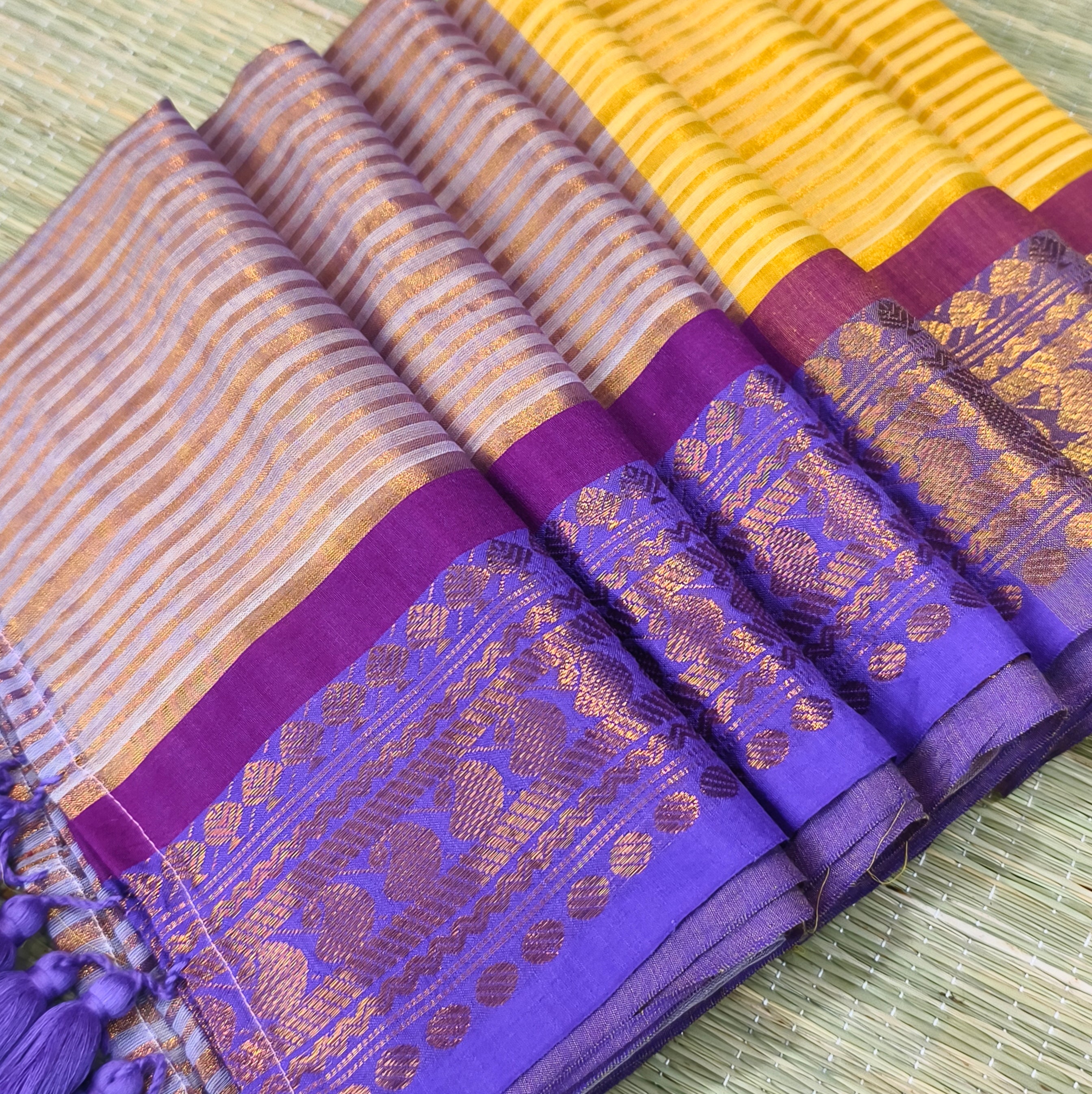 Mul cotton saree with all over zari stripes & kanchi border