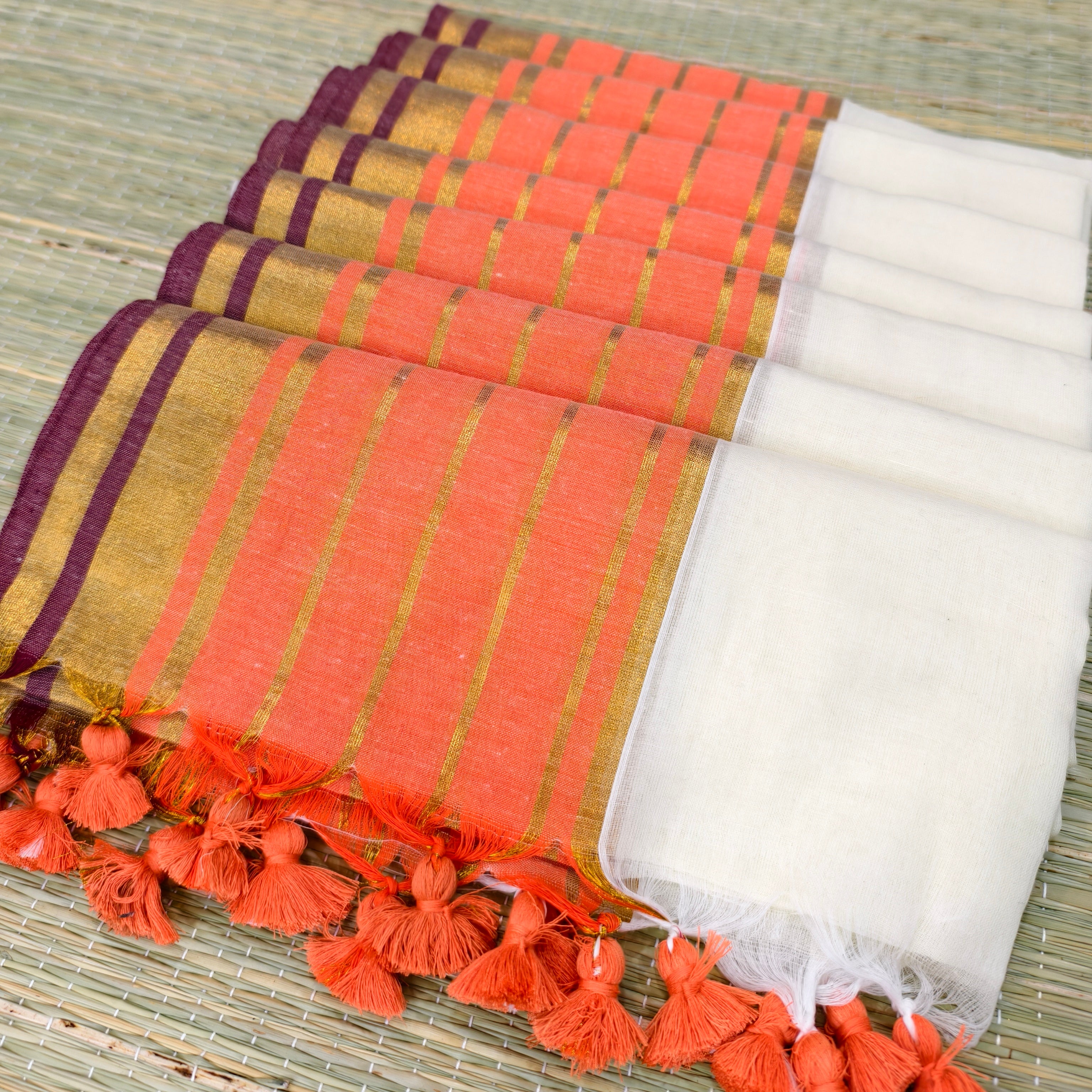 Mul cotton saree with orange and zari stripe border