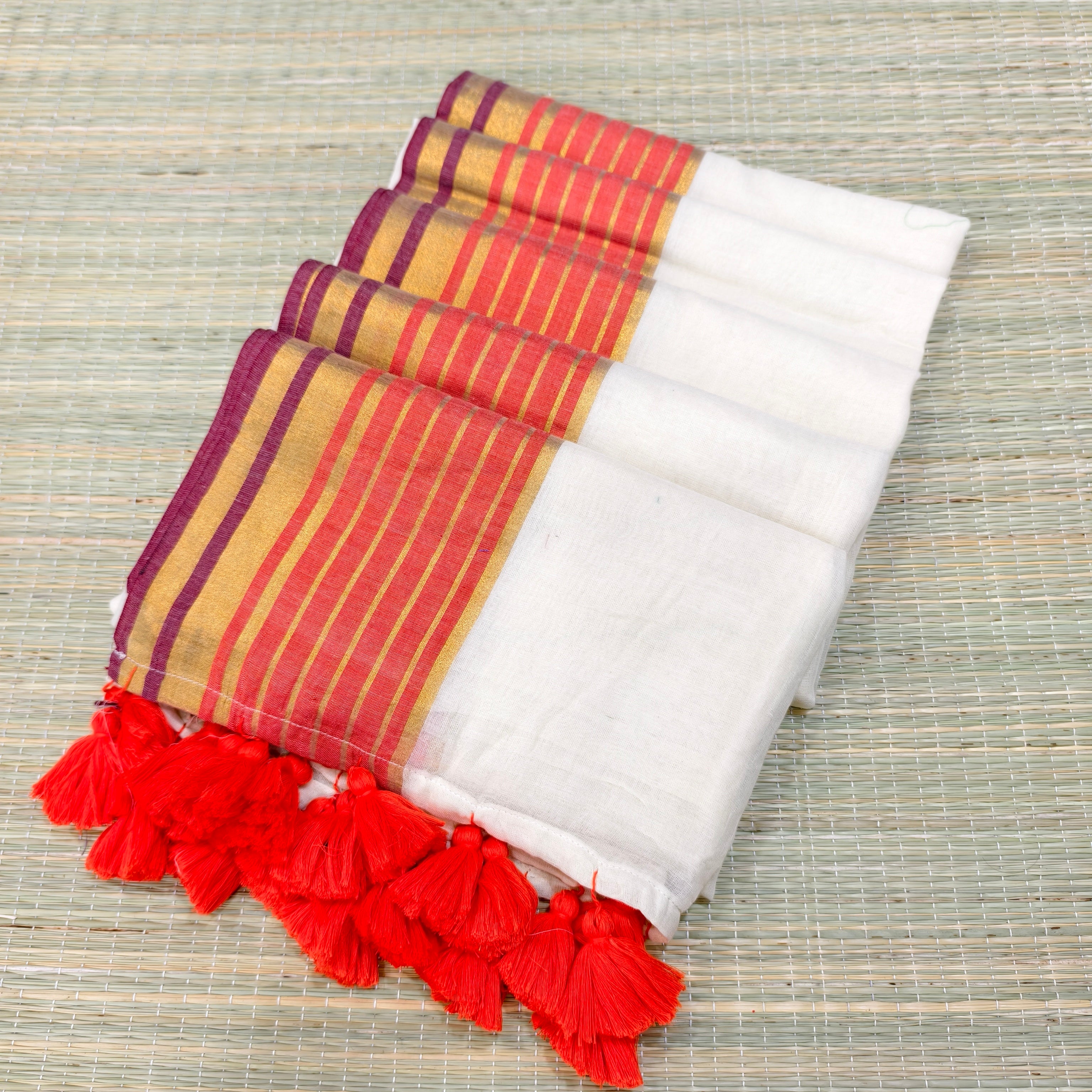 Mul cotton saree with orange and zari stripe border