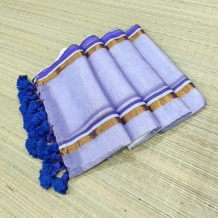 white mul cotton saree with lavender pallu
