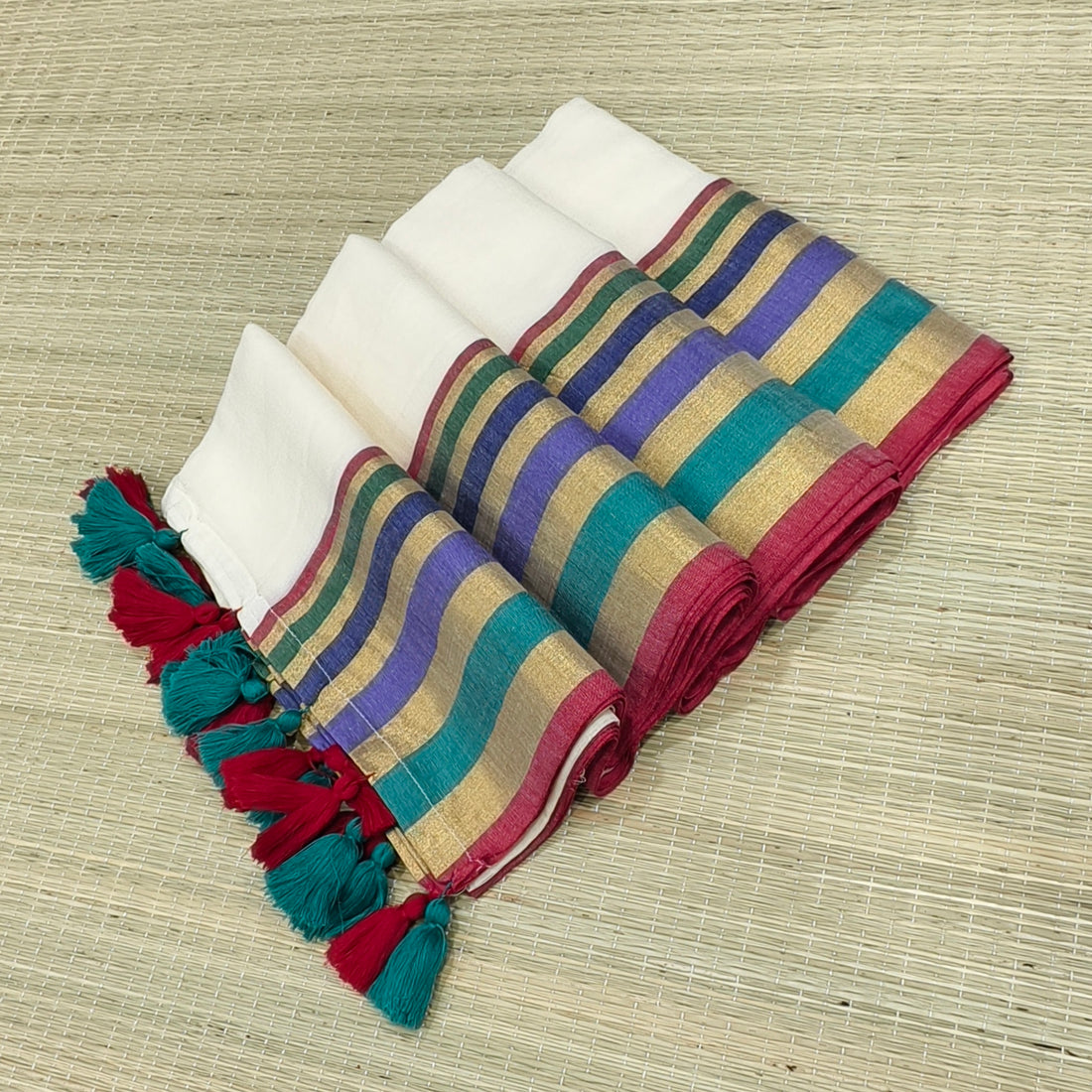 Premium off white mul cotton saree with multicolor border